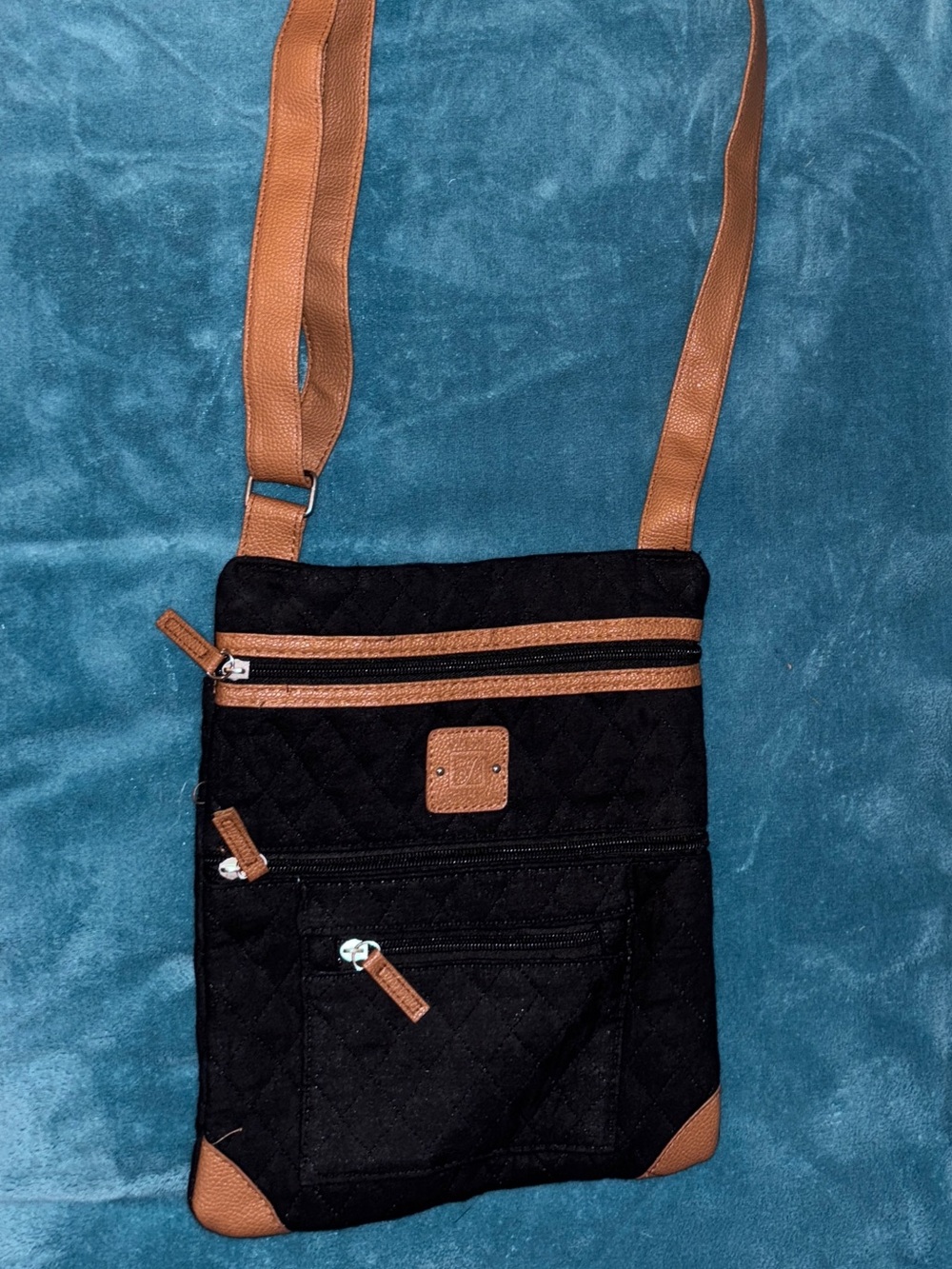 Stone Mountain Accessories Black Crossbody Bag with Brown Trim